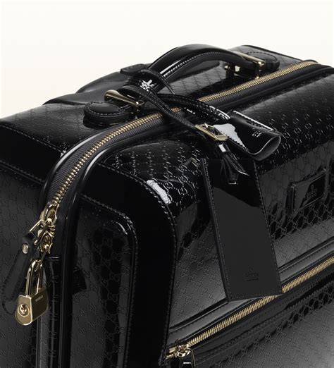 shall gucci|gucci leather suitcase.